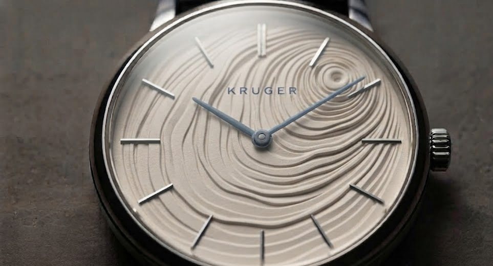 Cream commemorative dial carrying growth rings