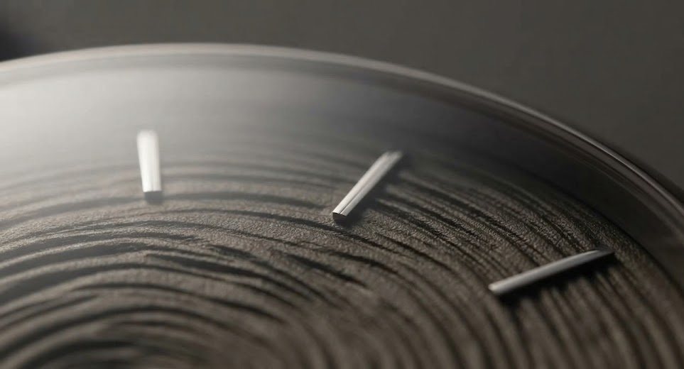 Macro detail of a silvered dial surface